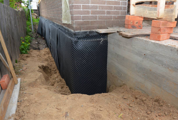 SJ Waterproofing Pros technician performing targeted Emergency Waterproofing assessment in Springfield, VA
